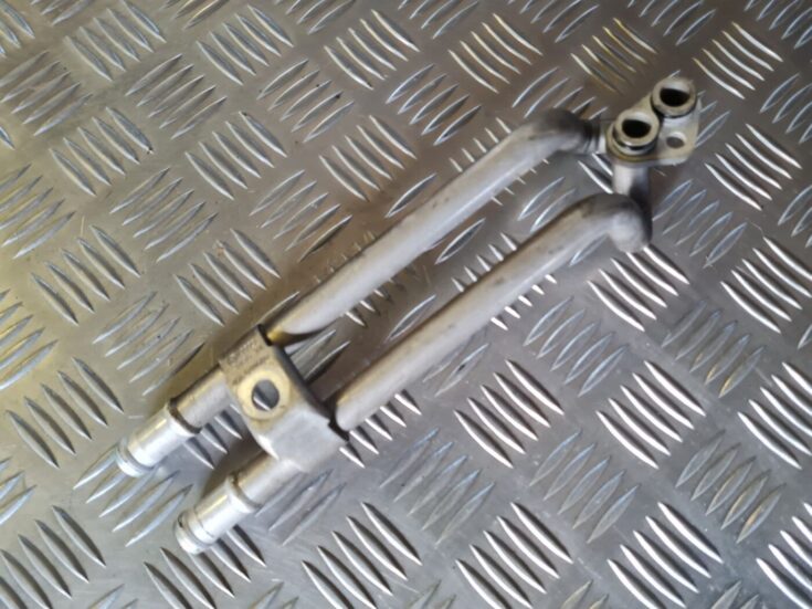Eļļas radiatora caurule priekš VW GOLF 5 2004